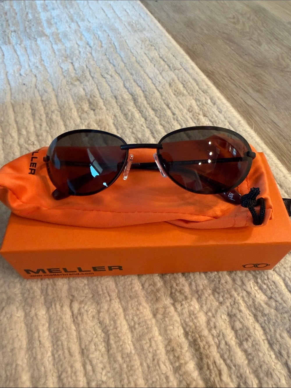 Meller Black Oval Sunglasses